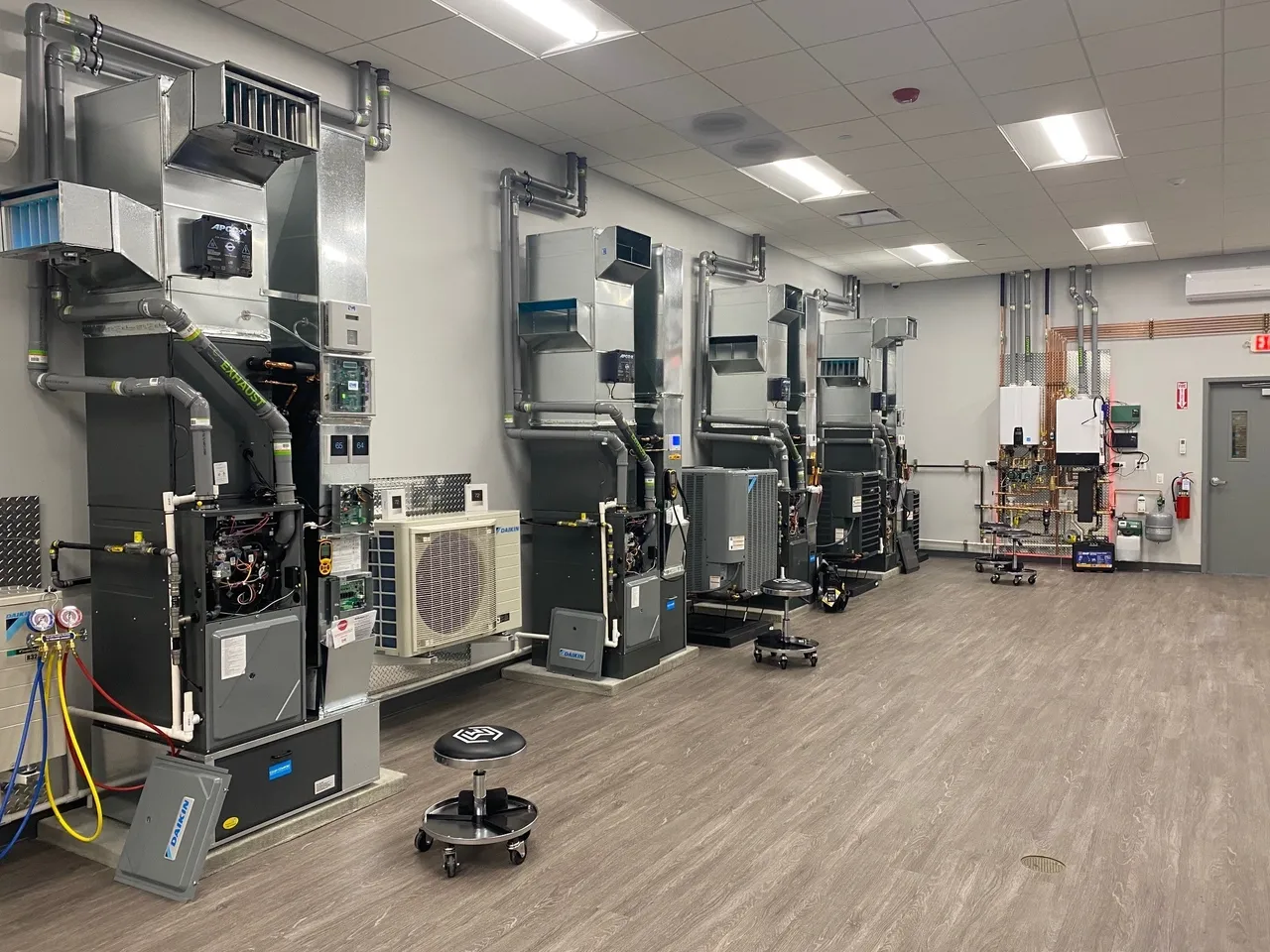 A room filled with many different types of air conditioners.