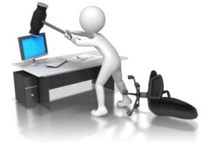 A 3D stick figure character uses a large hammer to smash a computer monitor on a desk, with a fallen office chair next to the desk.